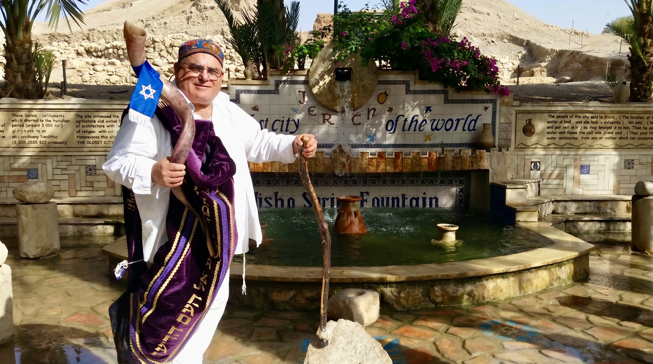 Robert Weinger in full regalia at the Elisha Spring fountain in Jericho, welcoming visitors